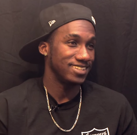 Hopsin in a black t-shirt caught on the camera.